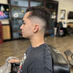 Moose's Barber Shop and Shave - Mid-high fade