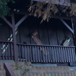 Cozy Lodge - Front of lodge displaying a few toys