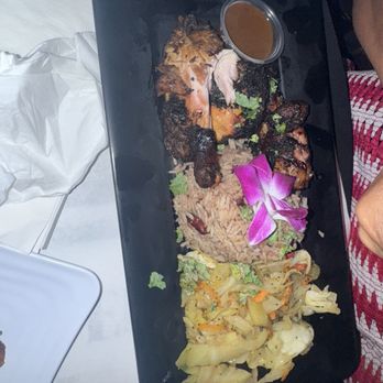 Heroes Island Cusine Lounge - Jerk chicken - Lounges Near Me - Dallas, Texas