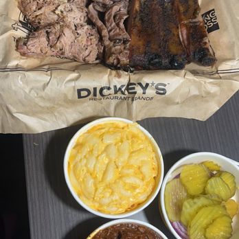Dickey's Barbecue Pit - 3 choice meat Ribs, pulled pork, brisket Roll, Mac & cheese, brisket chili, side of pickles and onions - American Near Me - Butte, Montana Dickey's Barbecue Pit - 3 choice meat Ribs, pulled pork, brisket Roll, Mac & cheese, brisket chili, side of pickles and onions - American Near Me - Butte, Montana