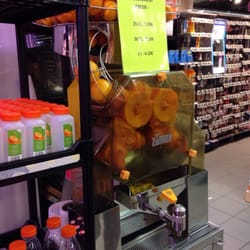 Intermarché Express - La machine à orange pressée en libre service ds le magasin