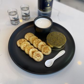 Absolute Caviar - a plate of food and a bottle of caviar - Specialty Food Near Me - Calabasas, California Absolute Caviar - a plate of food and a bottle of caviar - Specialty Food Near Me - Calabasas, California