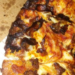 Domino's Pizza - Waited over an hour for this. Half of the toppings were inedible due to burning, somehow all of the philly steak was thrown onto the crust?