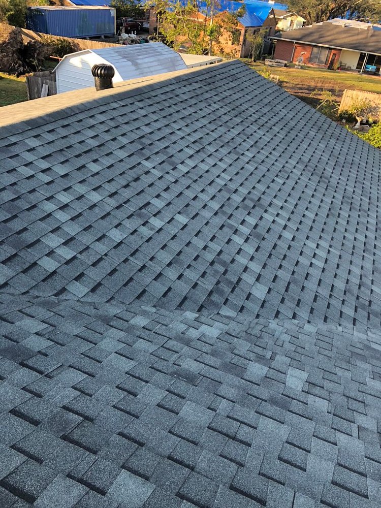 Slide of Pelican Roofing Company