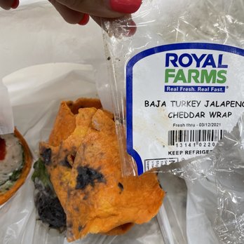 Royal Farms - a hand holding a bag of chips - Gas Stations Near Me - Mount Laurel, New Jersey