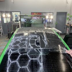 Flatirons Tint And Clearbra - Full roof ppf before stretch and squeegee