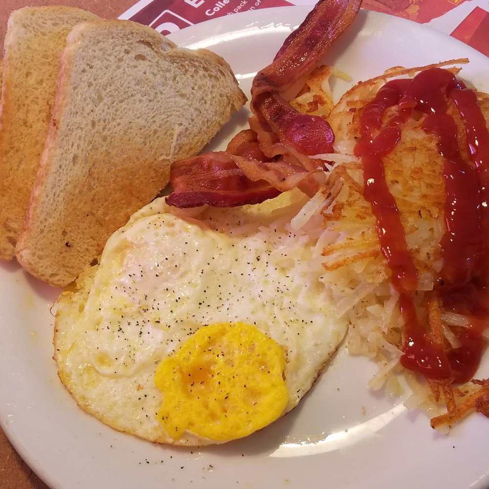 Denny's - I'm not too sure what's going on with my "over easy" egg and this thin likely microwaved bacon. - Diners Near Me - Page, Arizona Denny's - I'm not too sure what's going on with my "over easy" egg and this thin likely microwaved bacon. - Diners Near Me - Page, Arizona