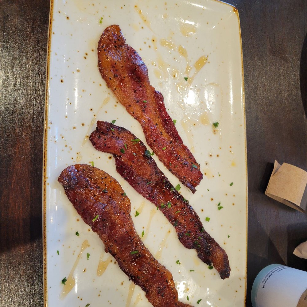 First Watch - Million dollar bacon (missing one slice as we couldn't wait to try it!) - Cafes Near Me - Tampa, Florida First Watch - Million dollar bacon (missing one slice as we couldn't wait to try it!) - Cafes Near Me - Tampa, Florida