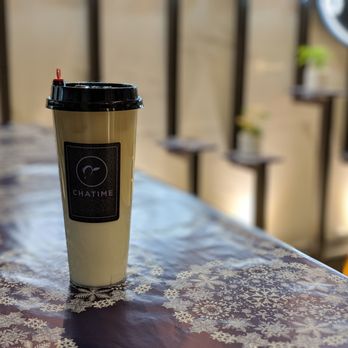 Chatime Innovation Bar - a coffee cup on a table - Bubble Tea Near Me - Toronto, Ontario