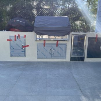 LA Bay Homes - Putting the finishing touches on this lovely outdoor barbecue area with a smoker built in. - General Contractors Near Me - Redondo Beach, California LA Bay Homes - Putting the finishing touches on this lovely outdoor barbecue area with a smoker built in. - General Contractors Near Me - Redondo Beach, California