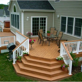 CAM Construction - Deck with separate seating and hot tub area - Fences & Gates Near Me CAM Construction - Deck with separate seating and hot tub area - Fences & Gates Near Me