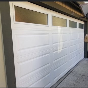 Premium Garage Doors - Steel front, steel back door with obscured windows - Garage Door Services Near Me Premium Garage Doors - Steel front, steel back door with obscured windows - Garage Door Services Near Me