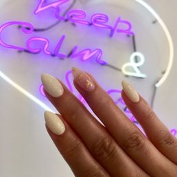 Almond liquid gel nails with OPI pastel yellow, gold foil, and fairy dust Almond liquid gel nails with OPI pastel yellow, gold foil, and fairy dust