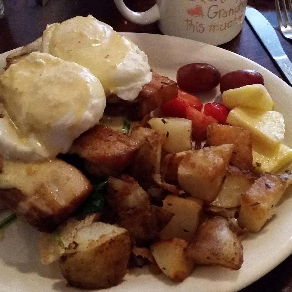 Pinky's - Pork Belly Benedict with Rosemary Potatoes and Fresh Fruit - Coffee & Tea Near Me - Tampa, Florida Pinky's - Pork Belly Benedict with Rosemary Potatoes and Fresh Fruit - Coffee & Tea Near Me - Tampa, Florida