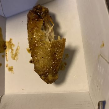 Buffalo Wild Wings - Is this a bite mark or ripped off? - Sports Bars Near Me - Troy, Michigan