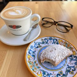 Incredible latte and dreamy pastry.  It's cold right next to the register.  This place is an Italian wonderland.