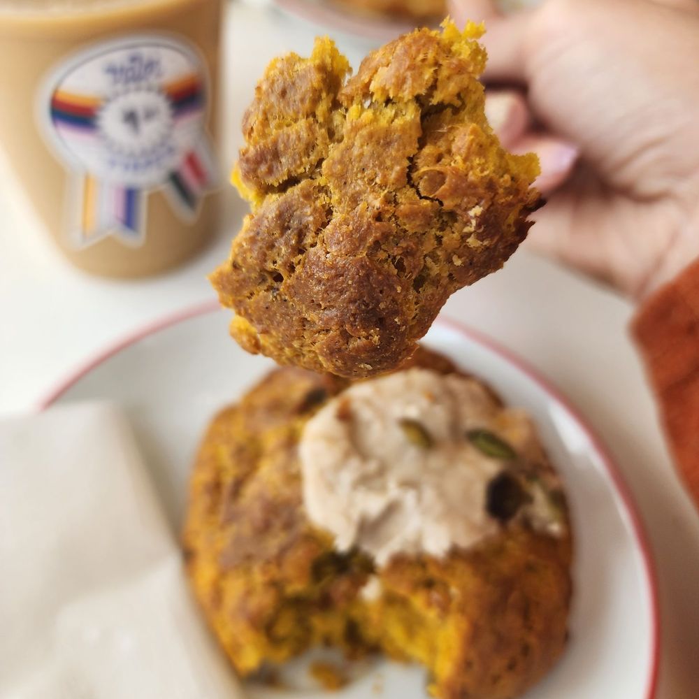 Valor Coffee - a hand holding a half eaten cookie - Coffee & Tea Near Me - Dunwoody, Georgia Valor Coffee - a hand holding a half eaten cookie - Coffee & Tea Near Me - Dunwoody, Georgia