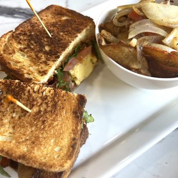 Poach Social - Bacon Egg Jam Sandwich with Breakfast Potato Skillet - Breakfast & Brunch Near Me - Atlanta, Georgia Poach Social - Bacon Egg Jam Sandwich with Breakfast Potato Skillet - Breakfast & Brunch Near Me - Atlanta, Georgia
