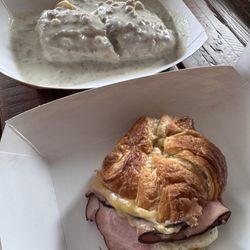 Stomp'n Grounds Espresso Bar - The Covered Wagon (gravy smothered breakfast burrito) and Ham, Egg & Gouda Croissant.