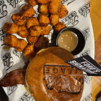 Ford's Garage - Ford's Signature Burger with Sweet Potato Tots - Burgers Near Me - Brandon, Florida Ford's Garage - Ford's Signature Burger with Sweet Potato Tots - Burgers Near Me - Brandon, Florida