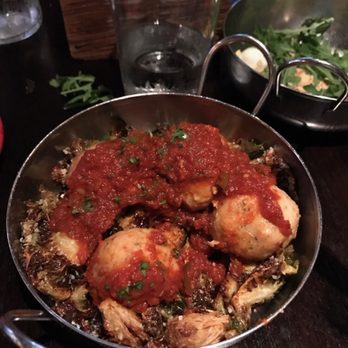 Sienna Mercato - Saucy chicken meatballs with spicy sauce over Brussels - Italian Near Me - Pittsburgh, Pennsylvania