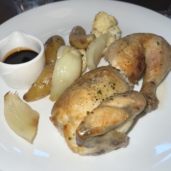 THE VERMILLION ROOM - Demi-Poulet ($56): roasted half-chicken, fingerling potatos with demi-poulet, fennel, cauliflower, natural jus - French Near Me - Banff, Alberta THE VERMILLION ROOM - Demi-Poulet ($56): roasted half-chicken, fingerling potatos with demi-poulet, fennel, cauliflower, natural jus - French Near Me - Banff, Alberta