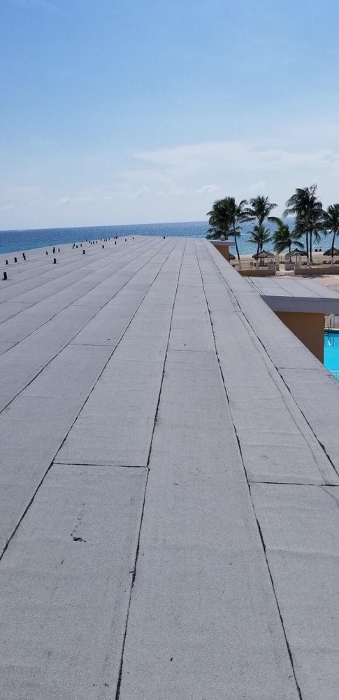 Slide of Dan Tennis Roofing