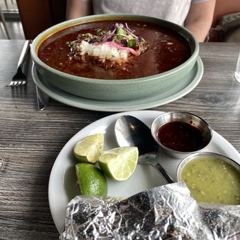 Ocotillo Prime - Caldo de Birria with corn tortillas, salsa, and limes. This picture does not do the size of this bowl justice. It was huge. - Breakfast & Brunch Near Me - American Fork, Utah Ocotillo Prime - Caldo de Birria with corn tortillas, salsa, and limes. This picture does not do the size of this bowl justice. It was huge. - Breakfast & Brunch Near Me - American Fork, Utah