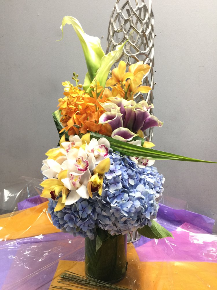 FLOWERS BY LINDA Florists 18660 Collins Ave, Sunny Isles Beach, FL