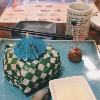 Sushi Run - Sushi burger wrapped up with cute little decor on dish. - Sushi Bars Near Me - Toronto, Ontario Sushi Run - Sushi burger wrapped up with cute little decor on dish. - Sushi Bars Near Me - Toronto, Ontario