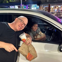 My friend Susan came to say hi. Her dog was tempted by my quad stack cheeseburger.
