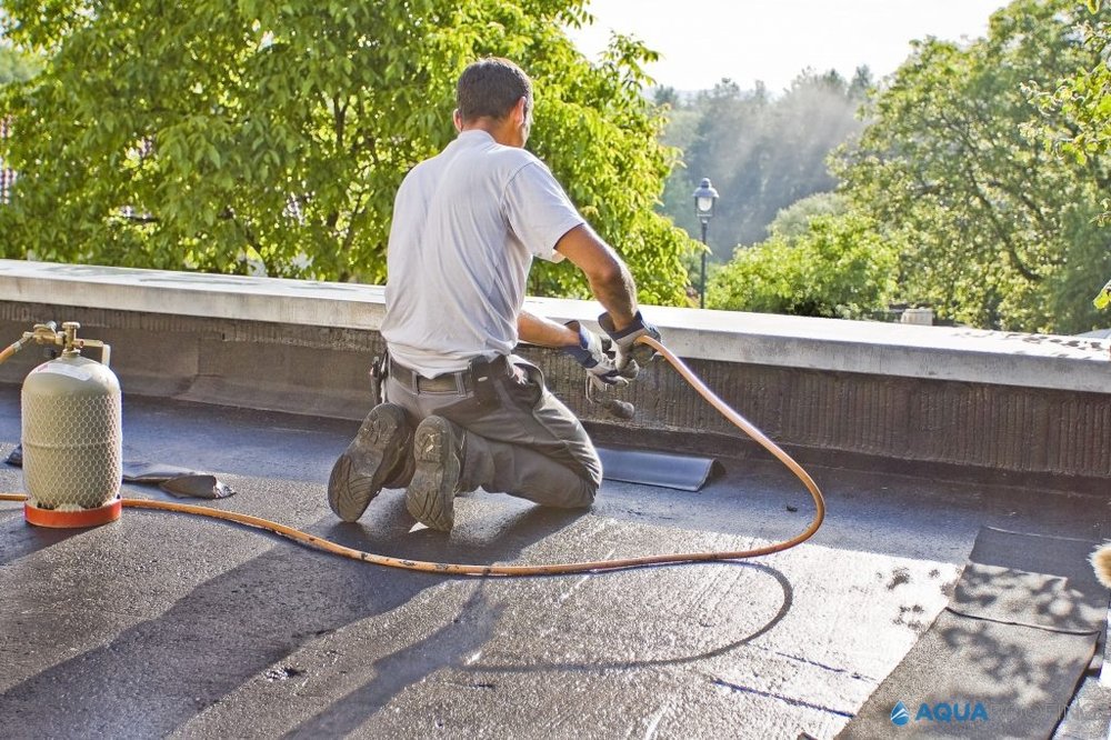 Slide of Aqua Roofing