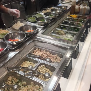 Pokeworks - assembly line - Poke Near Me - Houston, Texas Pokeworks - assembly line - Poke Near Me - Houston, Texas