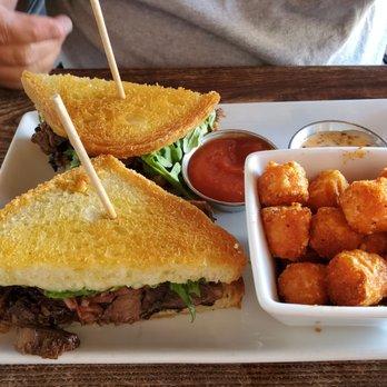 Smithy - Rib sandwich with sweet potato tots. - Breakfast & Brunch Near Me - Dallas, Texas Smithy - Rib sandwich with sweet potato tots. - Breakfast & Brunch Near Me - Dallas, Texas