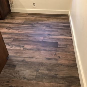 Villegas Construction & Restoration - a wood floor in a bathroom - General Contractors Near Me Villegas Construction & Restoration - a wood floor in a bathroom - General Contractors Near Me