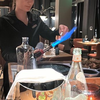 Bacan - Preparing the red snapper - Cocktail Bars Near Me - Orlando, Florida
