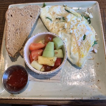 First Watch - Healthy Turkey Omelette - egg whites, onions, spinach, feta cheese, with dry artisan whole grain toast and fresh fruit. - Breakfast & Brunch Near Me - Hialeah, Florida