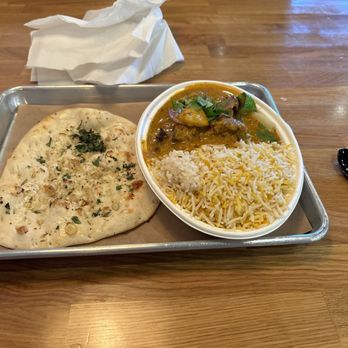 Tikka Shack Indian Grub - lamb vindaloo, rice, garlic naan. - Indian Near Me - Charlotte, North Carolina Tikka Shack Indian Grub - lamb vindaloo, rice, garlic naan. - Indian Near Me - Charlotte, North Carolina
