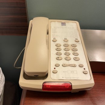 Sleep Inn & Suites - Even if someone wanted to use this filthy phone, how were they going to do so? There's no cord! There's no speakerphone - Hotels Near Me - Rapid City, South Dakota Sleep Inn & Suites - Even if someone wanted to use this filthy phone, how were they going to do so? There's no cord! There's no speakerphone - Hotels Near Me - Rapid City, South Dakota