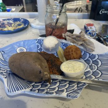 Aunt Catfish's - Lunch portion blackened salmon with baked sweet potato and hush puppy - Southern Near Me - Port Orange, Florida
