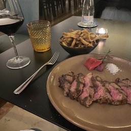 Steak, wine, French fries Steak, wine, French fries