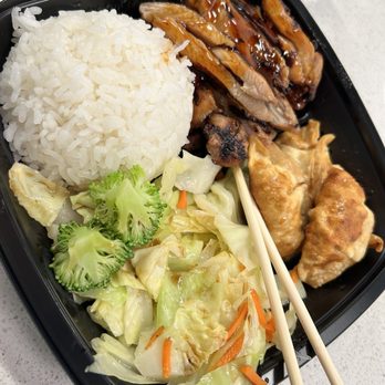 Happy Teriyaki - a meal in a plastic container with chopsticks - Asian Fusion Near Me - Pleasant Grove, Utah Happy Teriyaki - a meal in a plastic container with chopsticks - Asian Fusion Near Me - Pleasant Grove, Utah