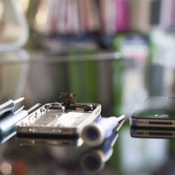 iPad Repair - We have just finished a photo shoot for our shop, will be uploading many more pictures like these.