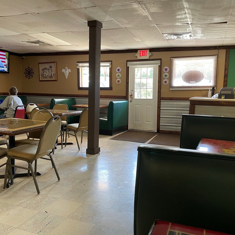 Cafe Azteca - a man sitting at a table - Mexican Near Me - Brandon, Mississippi Cafe Azteca - a man sitting at a table - Mexican Near Me - Brandon, Mississippi
