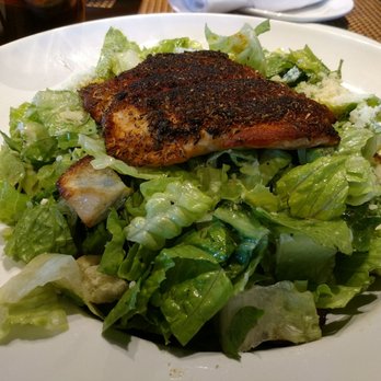 Rocket City Tavern - Blackened salmon Caesar with aioli on the side really good with fresh lemon squeezes - New American Near Me - Huntsville, Alabama Rocket City Tavern - Blackened salmon Caesar with aioli on the side really good with fresh lemon squeezes - New American Near Me - Huntsville, Alabama