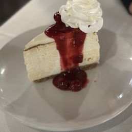 Cheesecake w/ cranberry sauce