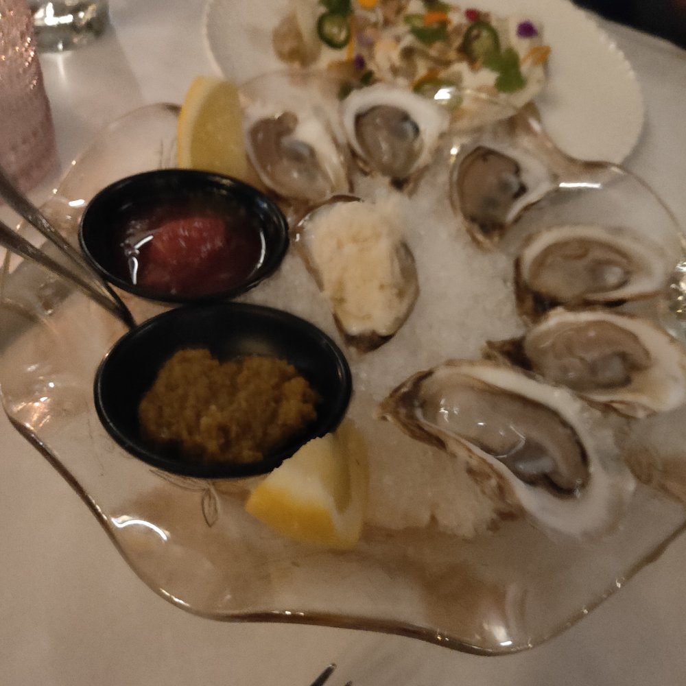 Leña Restaurante - Oysters ($1 each if you buy a bottle of wine) - Latin American Near Me - Toronto, Ontario Leña Restaurante - Oysters ($1 each if you buy a bottle of wine) - Latin American Near Me - Toronto, Ontario