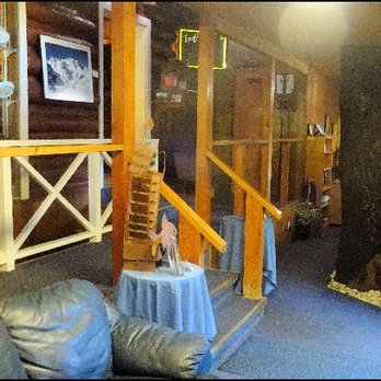 Sierra Pines Resort - The lobby of the restaurant and motel. Note the tree growing through the lobby. - American Near Me - Sierra City, California Sierra Pines Resort - The lobby of the restaurant and motel. Note the tree growing through the lobby. - American Near Me - Sierra City, California