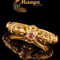 Uncut Diamond kada(Bracelet) with Rubies and emeralds.