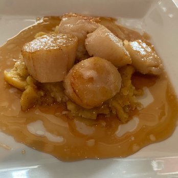Neumanali - Pan seared day boat scallops on sweet potato purée with brown butter and apple cider reduction. A bit on the sweet side. - New American Near Me - Hayward, California Neumanali - Pan seared day boat scallops on sweet potato purée with brown butter and apple cider reduction. A bit on the sweet side. - New American Near Me - Hayward, California
